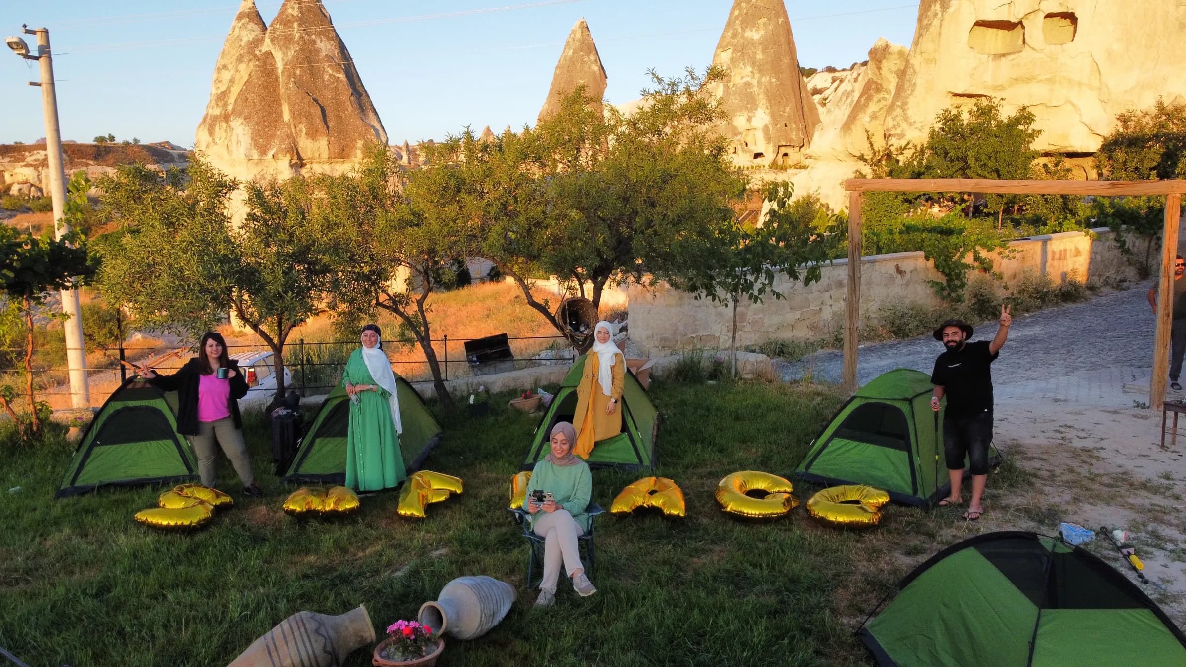 Travellers in Cappadocia with balloon letters spelling Safrago